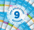 Lip Balm tubes with text ‘One sold every 9 seconds’