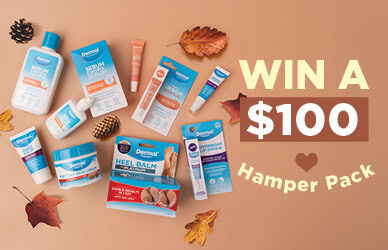 Promotional image set on a lighter brown background showing a selection of dermal therapy product packaging and text in white and light yellow: Win a $100 hamper pack