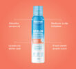 Promotional image with the Front View of the Dermal Therapy Sebum Control Dry Shampoo packaging on an orange background with four main details on the product written in white