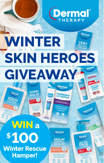 Promotional image set on a lighter icy blue background showcasing a selection of Dermal Therapy product packaging and text in navy, white and light yellow: Winter Skin Heroes Giveaway. Win a $100 winter rescue hamper