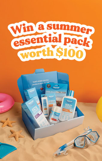 A blue gift box filled with Dermal Therapy skincare products displayed on sand with summer accessories like snorkel gear and starfish. Text overlay reads: “Win a summer essential pack worth $100.”