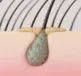 A hair root in a scalp showing scalp sebum build up