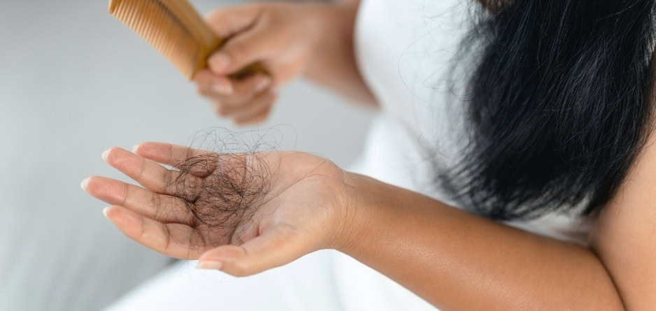 A new mum experiencing postpartum hair loss and wondering what the solution is - Dermal Therapy Hair Restoring Shampoo & Conditioner