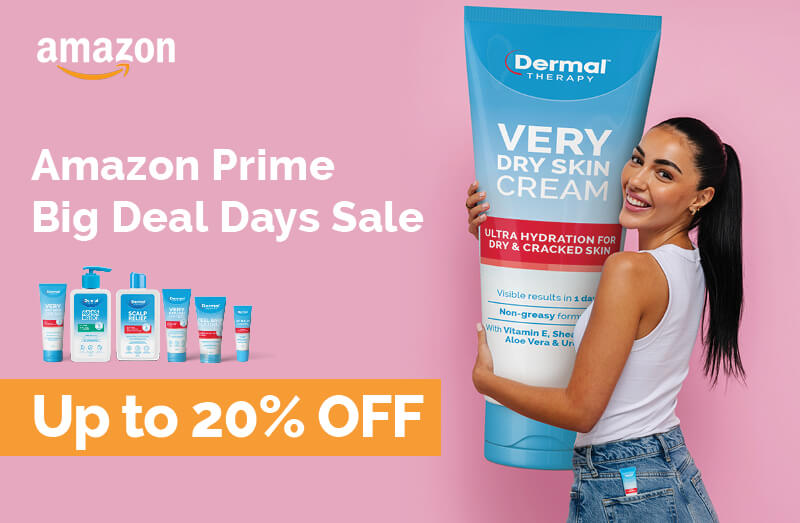 Dermal Therapy homepage banner promoting Amazon Prime Big Deal Days Sale with up to 20% off. Pink background featuring a person holding an oversized Dermal Therapy Very Dry Skin Cream tube, a range of Dermal Therapy products, Amazon logo and sale text.